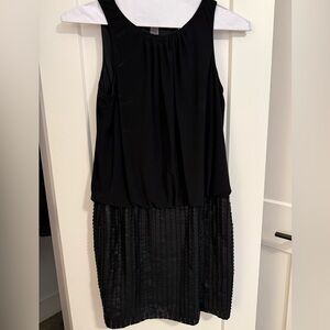 Black cocktail dress with faux leather bottom
